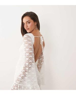 The Frolic Exclusive Boat Neck Open Back Frill Sleeve & Hem Mini Dress - White