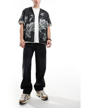 Pull&Bear Jean baggy avec déchirures - Noir