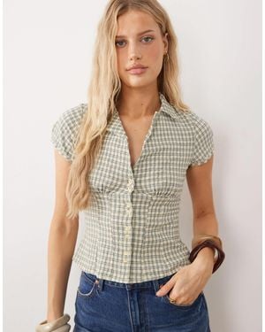 Free People – figurbetonte, kurzärmlige bluse mit vichy-karomuster - Natur