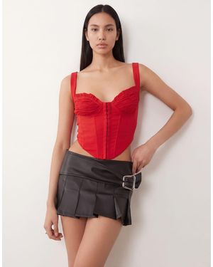 I.AM.GIA Desmina Leather Look Buckle Detail Pleated Mini Skirt - Black