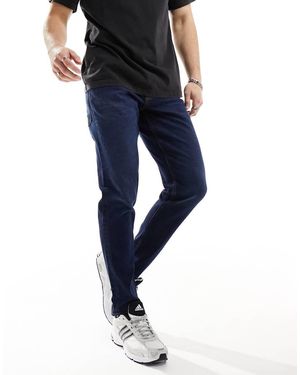 ASOS Jeans Stretch Affusolati Lavaggio Scuro - Blu
