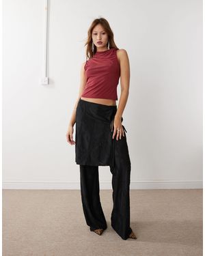 Weekday Naomi - pantalon semi-transparent à taille basse effet dévoré à assortir - Noir