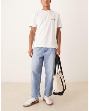 ASOS Vaqueros Azules De Corte Tapered Holgado Con Lavado Claro De - Blanco