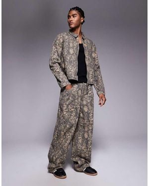 Liquor N Poker Ruimvallende Baggy Jeans Met Slangenprint - Grijs