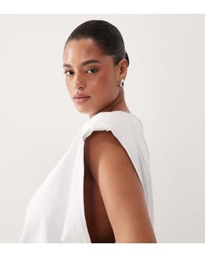 ARRANGE Curve Shoulder Pad Side Split Oversized Sleeveless Tee - White