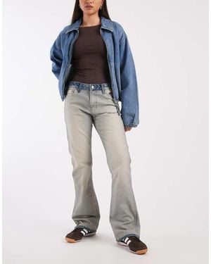 Calvin Klein Vaqueros De Corte Bootcut Con Lavado A La Y Cinturilla En Contraste De Algodón De -Neutro - Azul