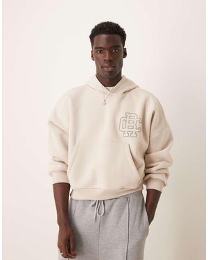 ASOS Felpa Con Cappuccio Corta Oversize Con Spalle Scese Avena Mélange Con Stampa College Sul Petto - Neutro