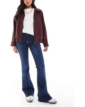 Bershka Petite High Waisted Flared Jeans - Blue