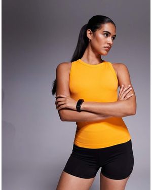 4505 Camiseta Color Mandarina Acanalada De Corte Slim Sin Mangas Ni Costuras De Estilo Años 90 De -Naranja