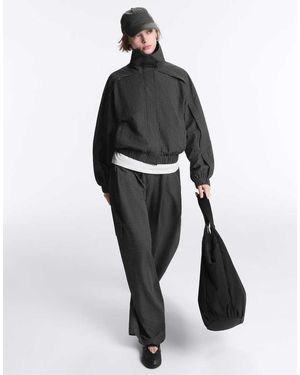 Oysho Waterrepellent Checked Nylon Cargo Trousers - White