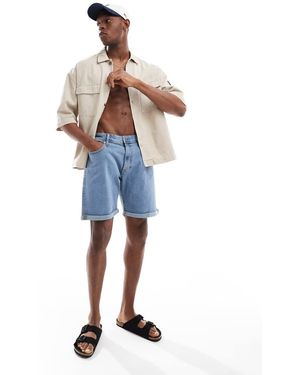 JJ Rebel Pantalones Cortos Vaqueros Azul Claro Con Bajos Vueltos De