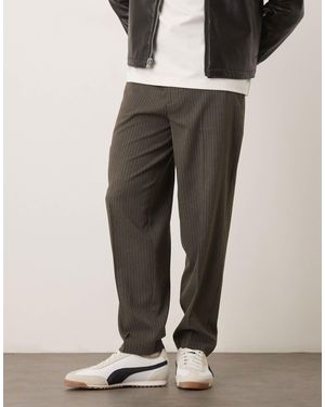 ASOS – schicke, schmal zulaufende oversize-hose aus flanell - Schwarz
