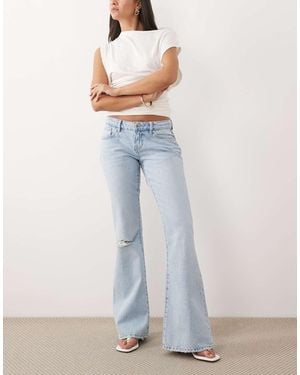 Gina Tricot Vaqueros De Talle Bajo Y Corte Acampanado Con Y Diseño Rasgado De - Azul