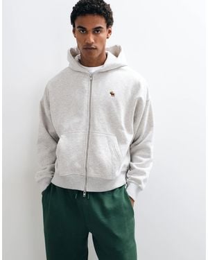 Abercrombie & Fitch Sweat à capuche zippé logo icon en clair - Gris