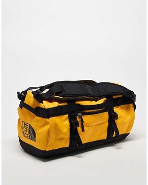The North Face Petate Muy Pequeño Negro Y Amarillo Base Camp De - Naranja