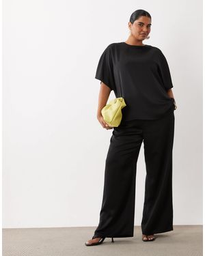 Pretty Lavish Curve – breya – satinhose - Schwarz
