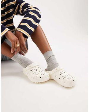 Crocs™ Classic Floral Cut Out Clogs - White