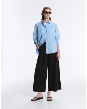 Oysho Soft-Touch Wide-Leg Crop Trousers With Modal And Pleats - Blue