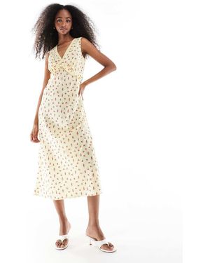 Wednesday's Girl Ditsy Floral V-neck Midi Dress - White