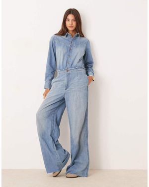 Wrangler Tuta Jumpsuit Con Fondo Ampio Stile Western E Orlo Grezzo Lavaggio Chiaro - Blu