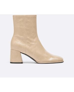 Stradivarius Bottines à talons à tige ajustée beige - Blanc