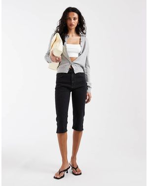 ASOS Vaqueros Capri Negros Con Bolsillos Delanteros De