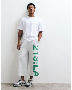 ASOS Short en jean long oversize avec passepoil et imprimé, clair - Blanc
