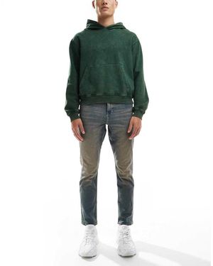 ASOS Jeans Slim Elasticizzati Lavaggio Tinto Medio Vintage - Verde