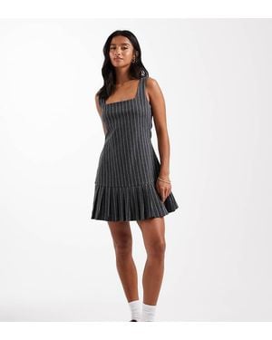 Miss Selfridge Pinstripe Pinny Dress With Drop Waist Pleated Hem - Black