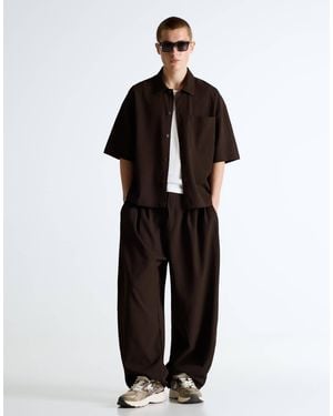 Bershka – plissierte, superweite hose im jogging-look - Schwarz