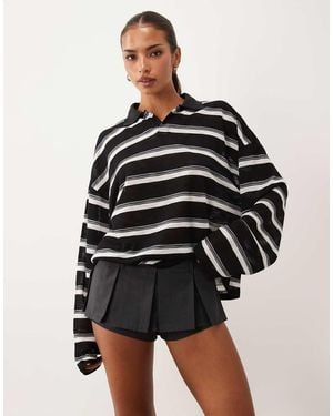 Lioness Allure Geplooide Ultra Mini Skort - Zwart