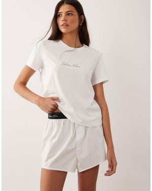 Calvin Klein Ensemble avec t-shirt et short - Blanc