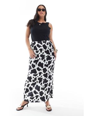 Renee Studio Plus exklusiv – maxirock aus satin mit schwarz-weißem kuhfellmuster