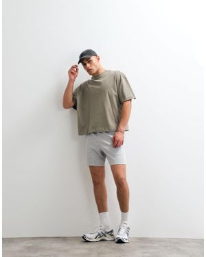 4505 Short d'entraînement ultra doux en mélange modal avec poches zippées en chiné - Blanc