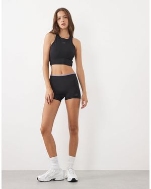 New Balance Short graphique fast days - Noir