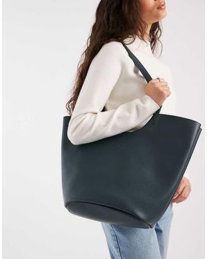 PASQ Tote Tas Met Rond Detail En Dubbele Bandjes - Blauw