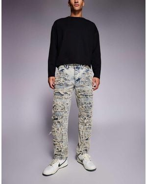 Liquor N Poker Relaxed Stacked Rip Repair Denim Jeans - Blue