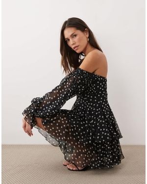 ASOS – schulterfreies, doppellagiges godet-minikleid mit polka-dot-print - Schwarz