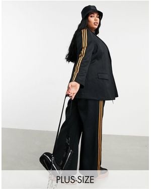 Ivy Park Adidas x Plus – Hose mit weit geschnittenem Bein - Schwarz