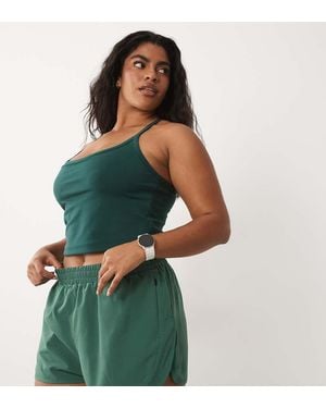 4505 Curve Icon Short Da Corsa Intrecciati Con Tasche Con Zip - Verde