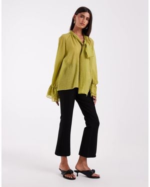 Vero Moda Sculpting Stretch High Waist Pleat Front Flare Trouser - Yellow