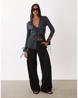 Lioness Volt - pantalon large d'ensemble à pinces - Noir