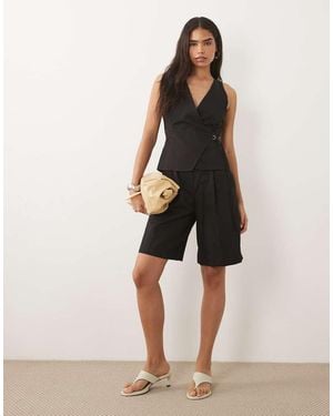 Mango Elegante Jumpsuit Met Gestrikte Taille - Naturel