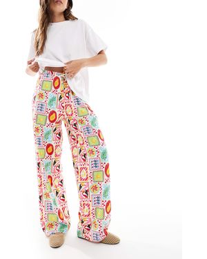 Threadbare – gerade geschnittene jersey-hose mit postkarten-print und kordelzugbund - Weiß