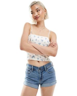 Hollister Denim Mini Short Met Lage Taille Met Contrasterende Omslag - Wit