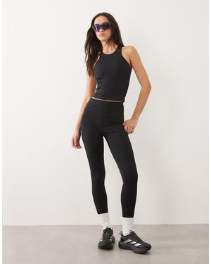 4505 Icon Active Tie Waist Run legging With Phone Pocket - Black