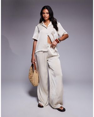 The Couture Club Emblem Satin Pants - Natural