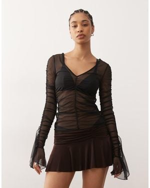 Monki Top A Maniche Lunghe Trasparente Con Volant - Nero