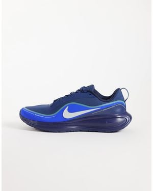 Nike Revolution 8 utility baskets en et bleu
