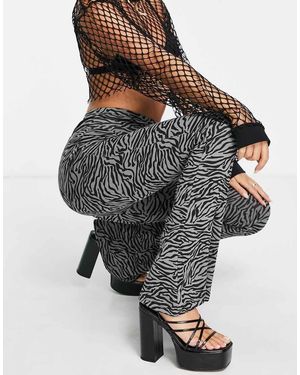 Urban Classics Pantaloni A Zampa Con Stampa Animalier - Multicolore